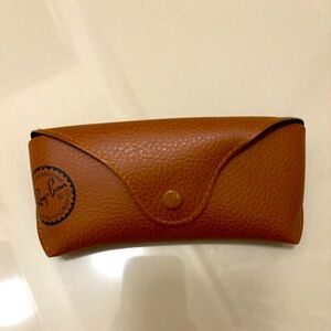 empty Ray Ban sunglasses case in brown